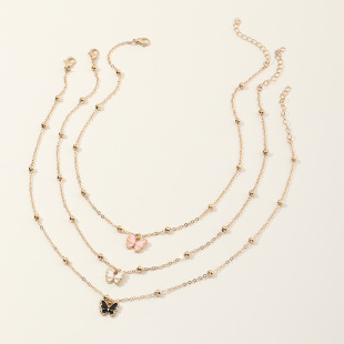 Cross-border European and American children's alloy oil drop butterfly necklace three combination ball bead chain Girls cute necklace set