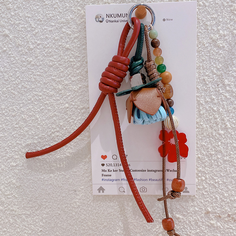 HD9217A04 cadena 05 estrellas otoño y invierno con la misma bola de flores de cuero PU llavero de coche colgante bolso colgante