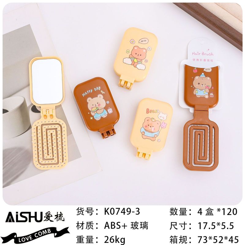 漫画のクマのシリーズのポータブルツーインワン 90% off スタックミラーコーム、かわいい漫画のピンクで、旅行に便利で収納しやすいコームです。|undefined