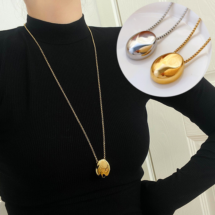 Colgante elíptico lujoso ligero estilo nicho personalidad collar de acero de titanio de mujer alta sensación nueva cadena de suéter no decolor