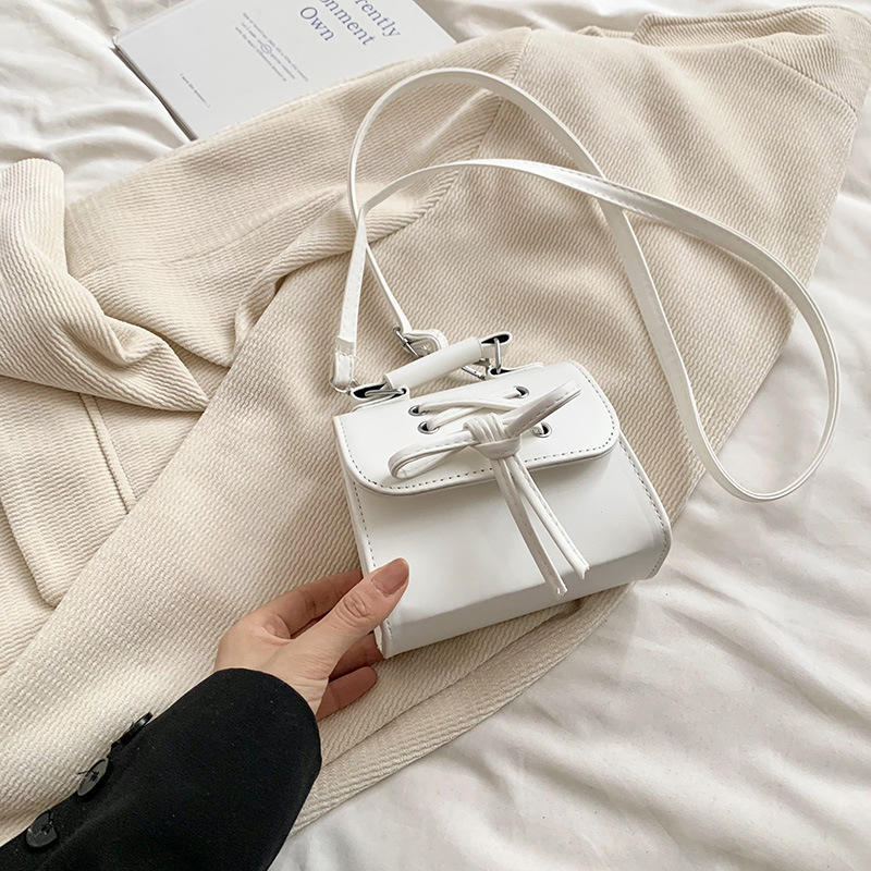 Diseño coreano de nicho bolso de mujer 2024 mini personalidad versátil bolso de moda arco de hombro bolso pequeño