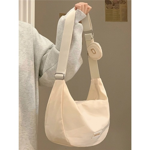 Nylon dumpling bag spring and summer ins trendy canvas bag versatile literary dumpling bag college student unit price messenger bag