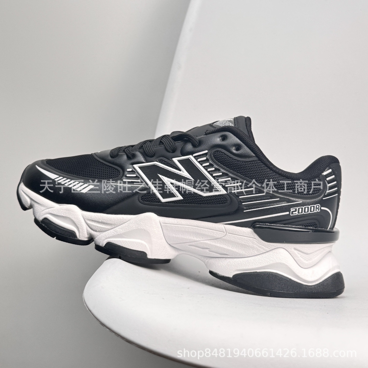 Putian NB M2000 serie de moda versátil tela de cuero artificial de cerdo amortiguador antideslizante desgaste zapatillas de correr bajas