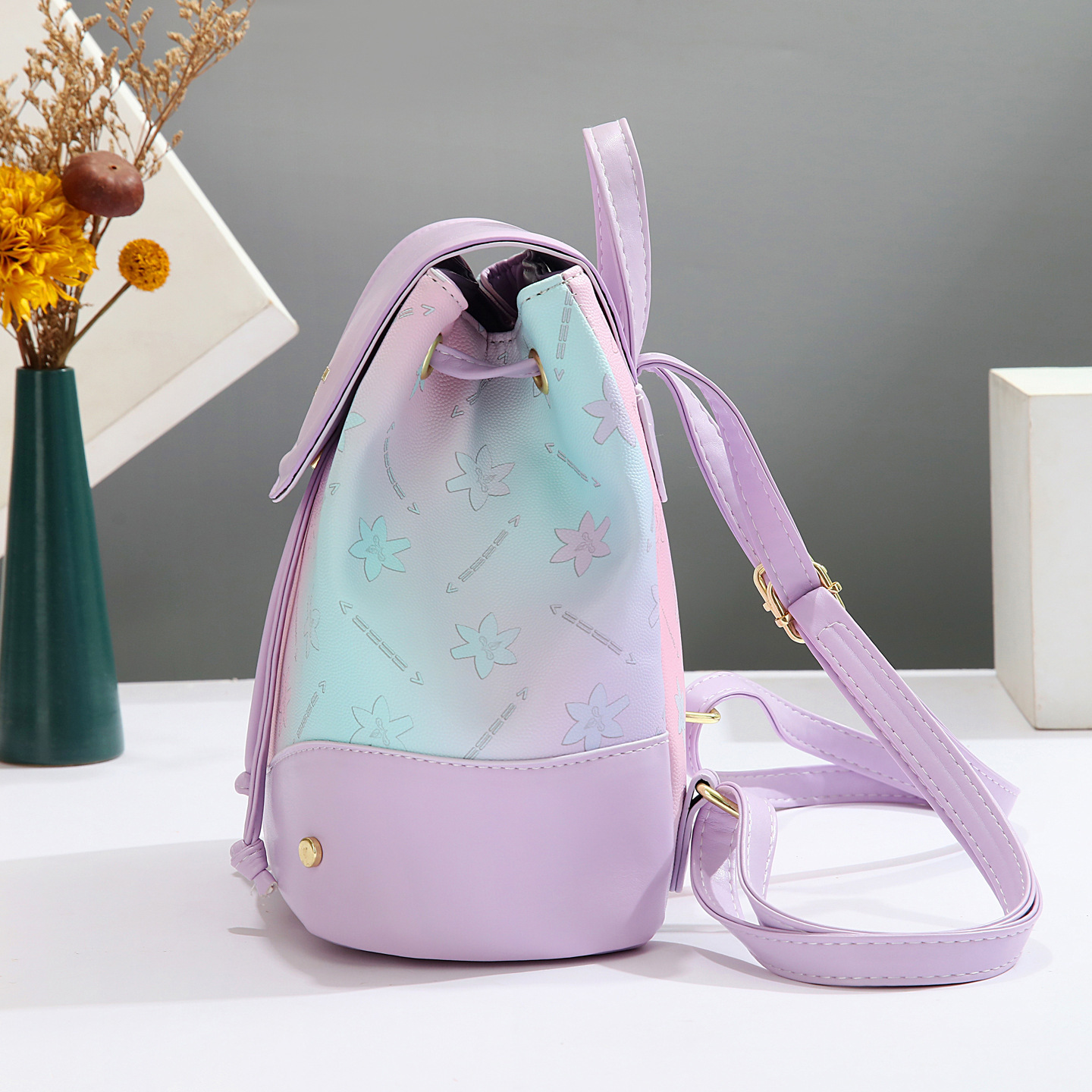 2025 nueva mochila de estilo universitario de moda de moda de impresión de moda de mujeres mochila de verano simple versátil mochila de estudiantes