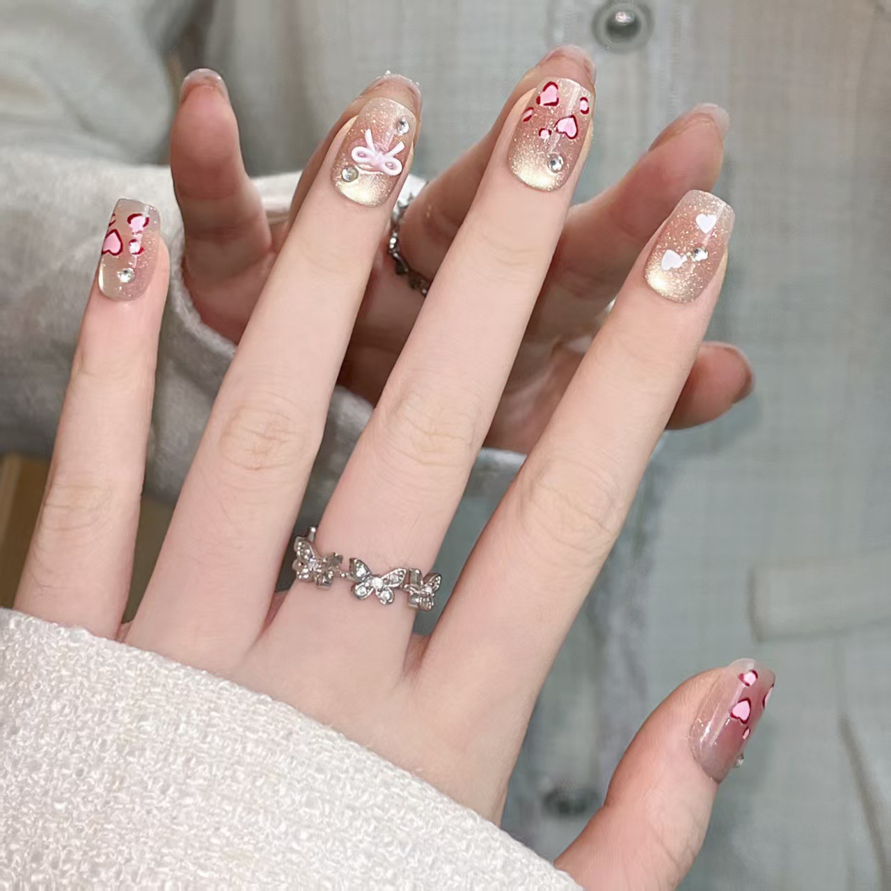 10 nuevos productos de primavera y verano, ojos de gato hechos a mano, crema de amor, lazo, armadura, parche de uñas blancas, producto terminado al por mayor