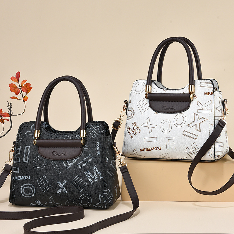 2024 fabricantes bolsos de mano de gran capacidad bolsos de mujer retro versátil bolsos de hombro texturas bolsos de tendencia