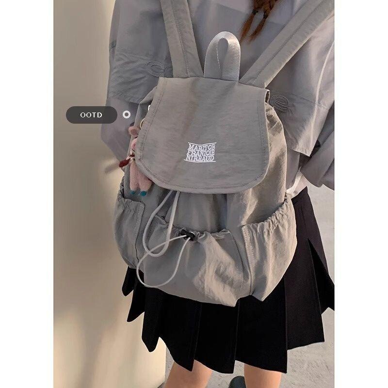 Korean Nylon Canvas Backpack for Women 2025 New Trendy Fashion Letter Backpack Casual Large Capacity Mountaineering Bag Korean Nylon Canvas Backpack for Women 2025 New Trendy Fashion Letter Backpack Casual Large Capacity Mountaineering Bag