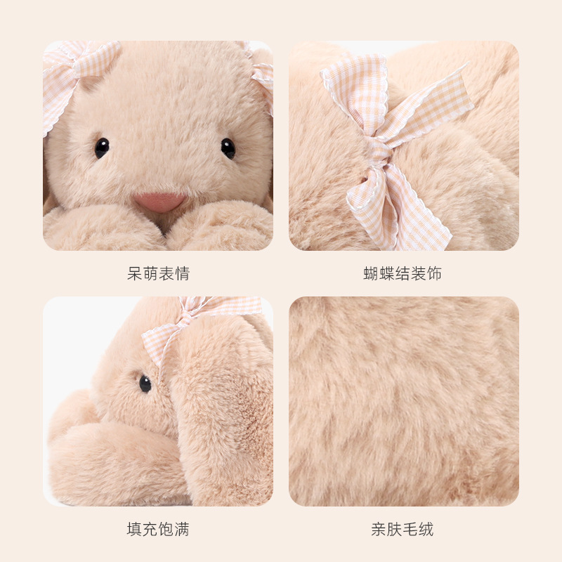 おもしろいジムニーウサギのぬいぐるみが可愛い人形が寝ています。|undefined