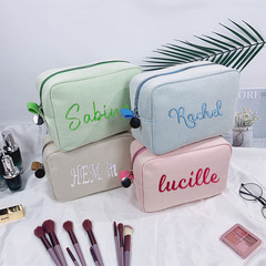 クロスボーダー刺繍名キャンバス化粧品バッグ大容量ポータブル収納袋シンプルなトイレタリーバッグレディースクラッチバッグ