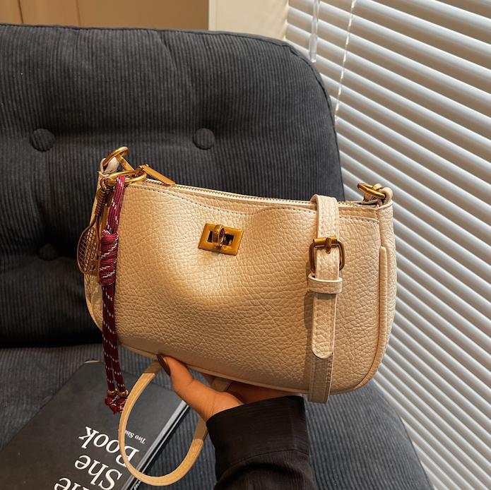 Bolso de explosión de comercio exterior para mujeres 2025 nuevo estilo universal retro de alta sensación bolso de hombro de moda universal bolso de hombro