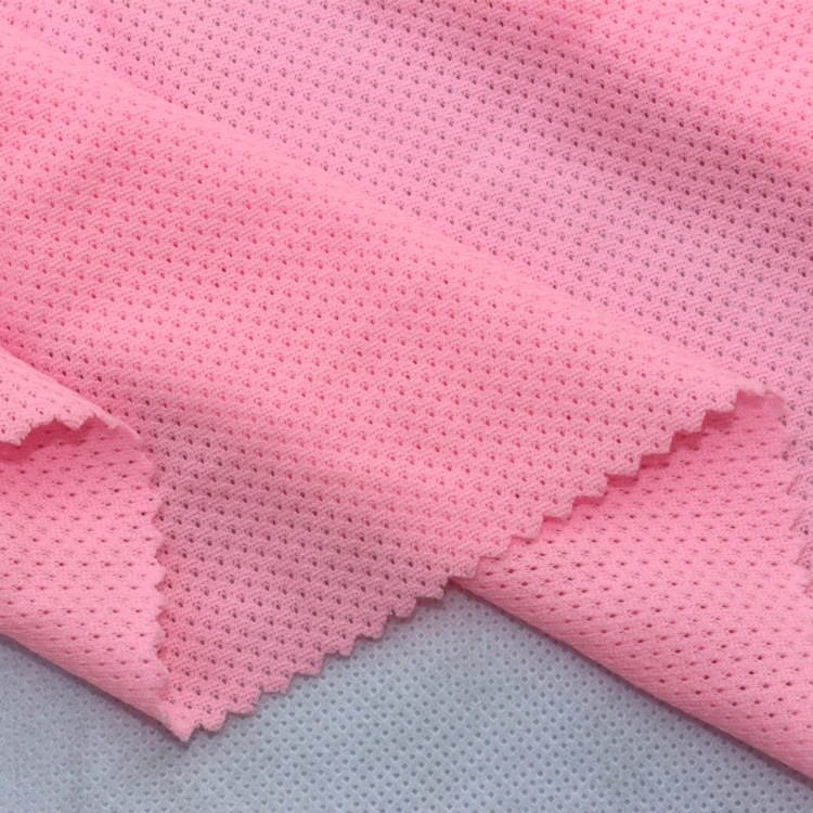 吸湿排汗荧光网眼布料针织纬编全涤无弹速干荧光染色菱形网眼布料