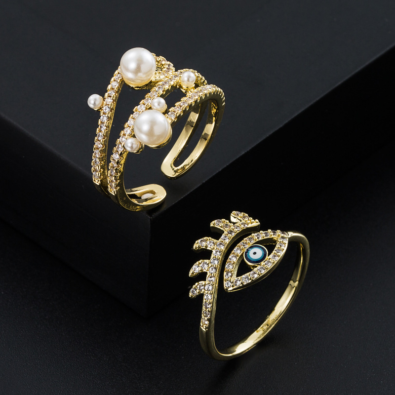 European and American fashion copperplated goldplated microinlaid zircon eyes pearl ringpicture2