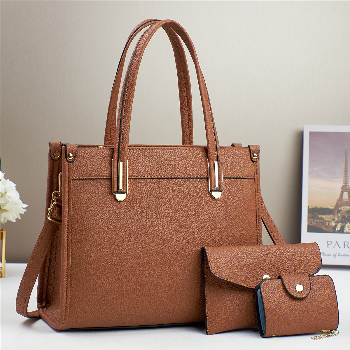 Fabricantes bolsos de comercio exterior mujeres 2025 nuevo bolso de mano mano textura de hombro liso inclinado bolso de moda de mujer coreana