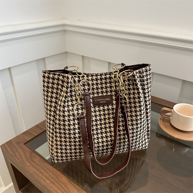 Bolsas retrógradas coreanas de mujeres 2024 otoño nuevo paquete de brazo de viaje de gran capacidad bolsas de hombro