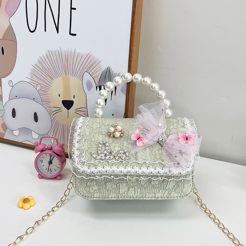 2023 nuevos niños bolsa de mensajero bolsa de moda princesa arco bolso de hombro coreano mini bolso de la cadena de la muchacha