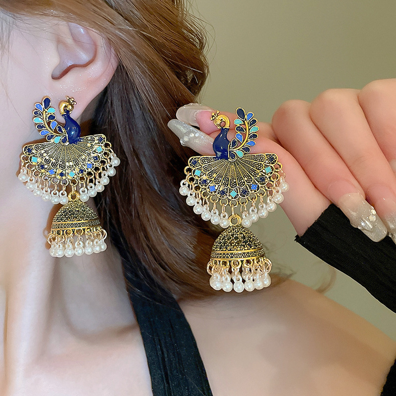 Pendientes de borla de media luna de fénix de estilo étnico Pendientes de diseño retro de nicho Pendientes de lujo ligero femenino de verano