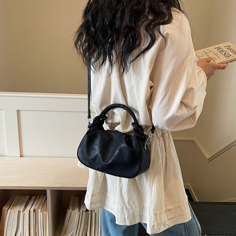 Textura de bolso de mano para mujeres 2026 nueva moda moda diaria de viaje de nicho coreano bolso de hombro