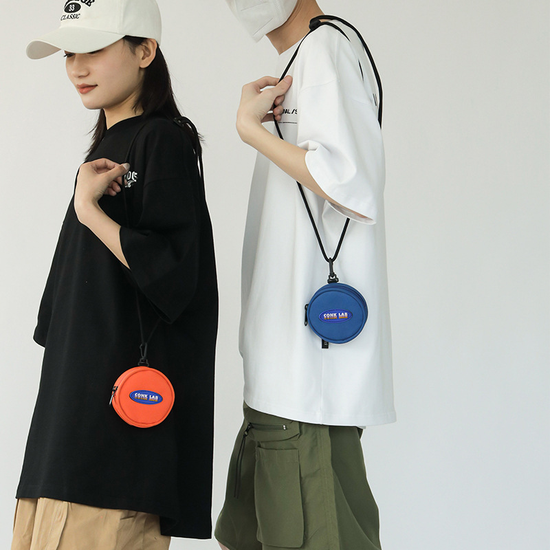 迷你小圆包包女零钱包耳机包男挂脖子包轻便装饰挂包单肩斜挎包女