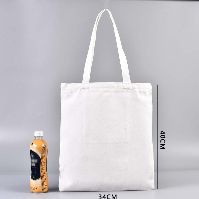 En stock bolsa de lona portátil en blanco personalizable logotipo de impresión en color de un solo hombro bolsa de compras bolsa de algodón de entrenamiento publicitario