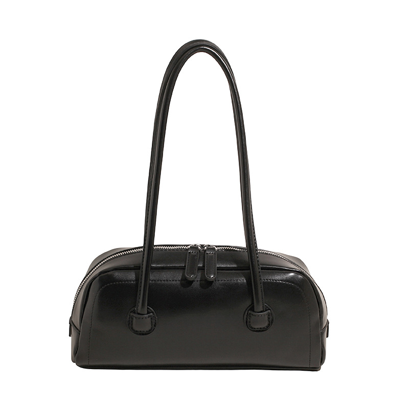 High-end nicho de moda bolso de hombro de mano para mujeres 2025 verano nuevo estilo simple bolso de viaje de palo bolso debajo de la axila