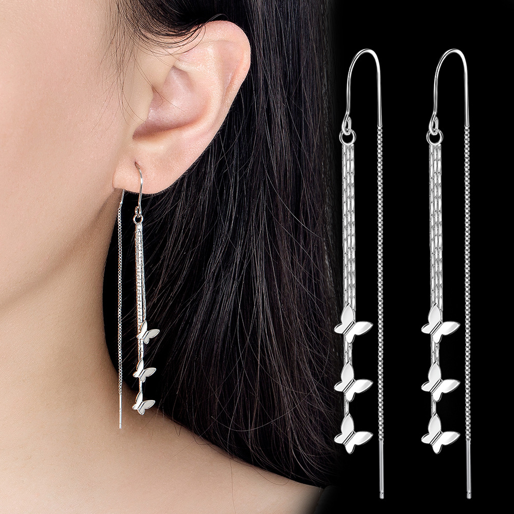 Protective elegant universal earrings with tassels