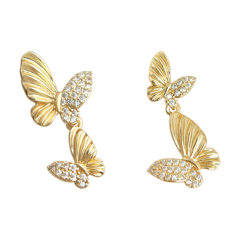 Vintage ligero estilo medio antiguo ligero circonio de lujo ligero aretes de mariposa doble estilo artístico francés retro aretes de alta gama mujeres
