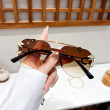 2025新款无框豹子头太阳镜女男士双梁个性切边一体蛤蟆镜跨镜批发