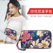 女士新款手拿包韓版女布包零錢包長款手機包大容量三層拉鏈手機袋