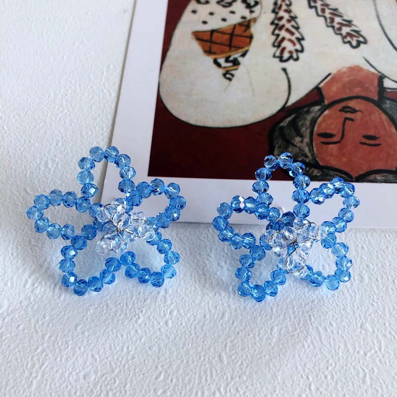 Wholesale Simple Woven Blue Flower Earrings Nihaojewelry display picture 1