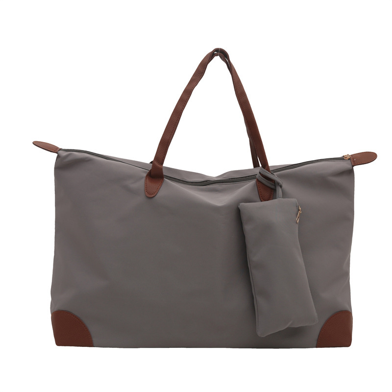 Bolsa de viaje para mujeres 2024 nueva sensación de alto nivel bolsas de bolsas de viajes portátiles bolsas de bolsas de moda de hombro de gran capacidad para mamá