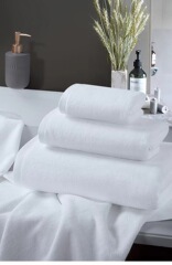 White cotton towels for five-star hotels, spas, inns, and guesthouses, can be customized with a logo.