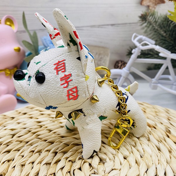 Bolsos de burro al por mayor cachorro red de cuero viejas flores dibujos animados pequeños par adornos de llaves de automóviles lindos