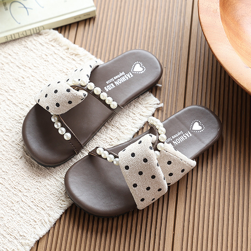Niñas punto de onda retrógrado con zapatillas 2026 verano nuevo periódico de moda infantil una moda de zapatillas