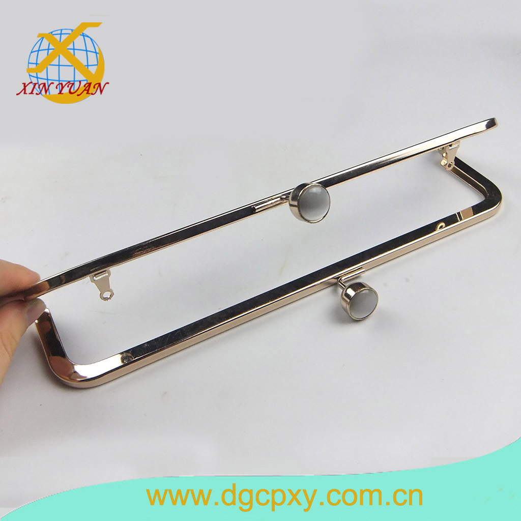 供应金色圆饼头镶钻手袋五金架 。各式金属女装包包五金配件