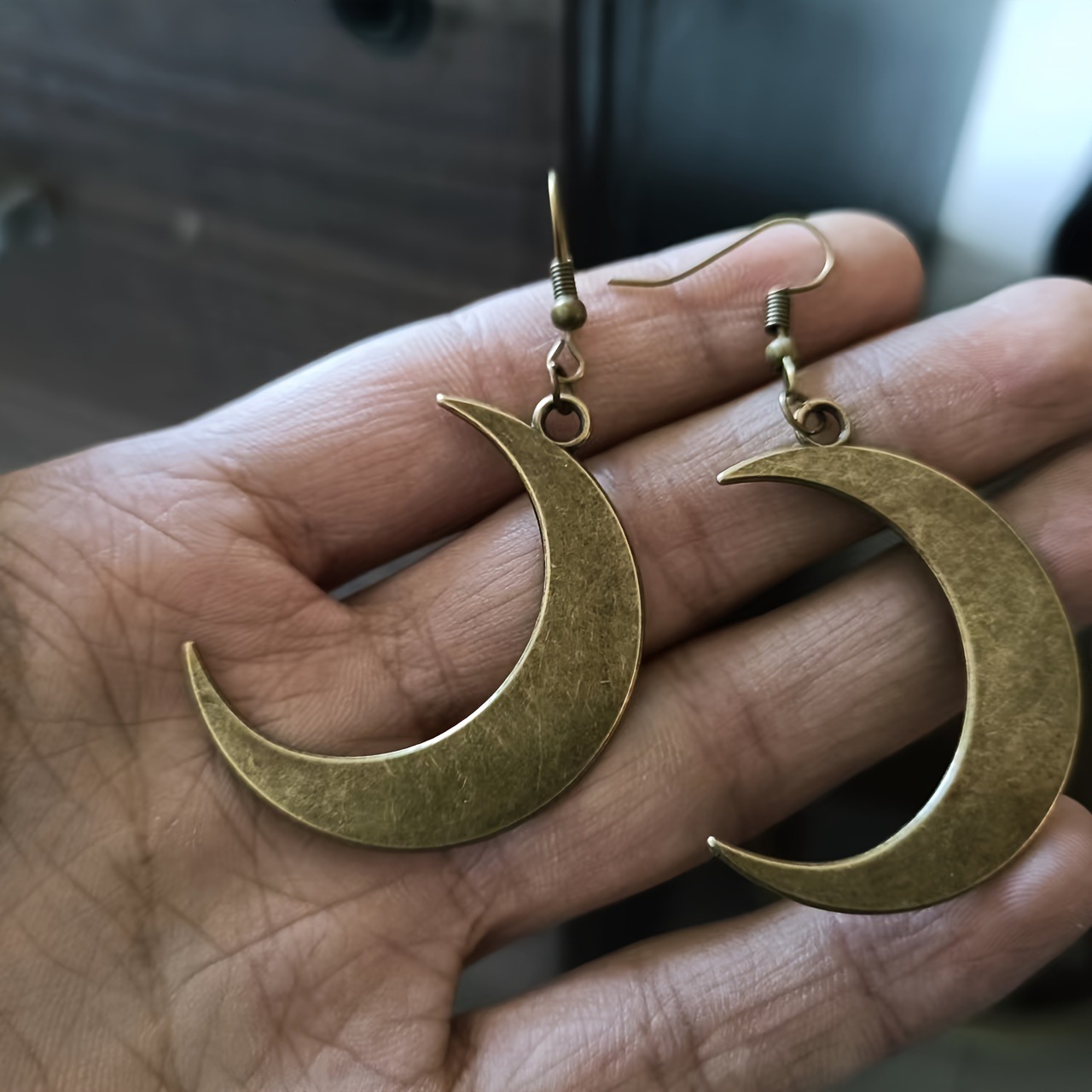Jasmine cross-border Europe and the United States hot-selling retro personality moon pendant earrings fashion natural wind ladies earrings wholesale