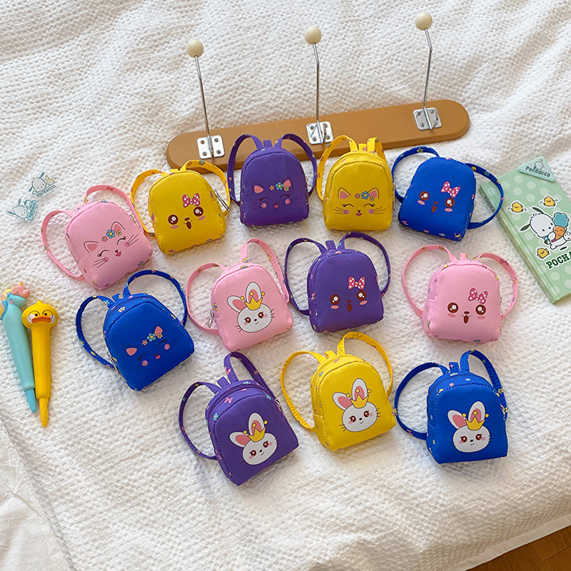 Caricatura lindo gatito para niños y niñas bolsas de cambio impresión de aire extranjero mini bolsas de juguetes para bebés nuevas bolsas de mano para niños