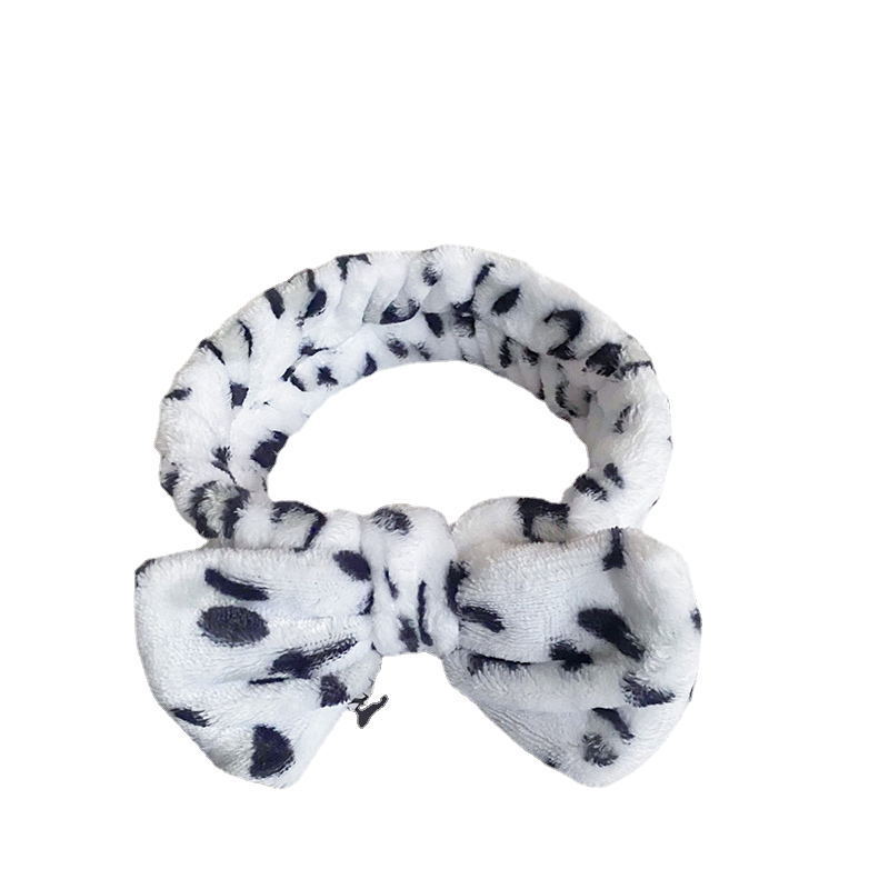 Europa y los Estados Unidos ondulado punto de leopardo coral mariposa fin correa de cabello mujer lavado cara banda de cabello rayas transfronterizas peluche adornamientos para el cabello al por mayor