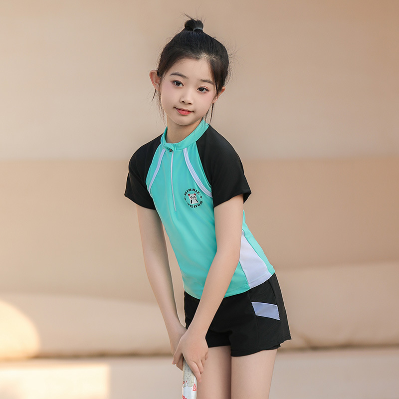 Niños trajes de baño de poliéster niña pequeña versión coreana de una pequeña falda deportiva fresca junior trajes de baño de aguas termales al por mayor