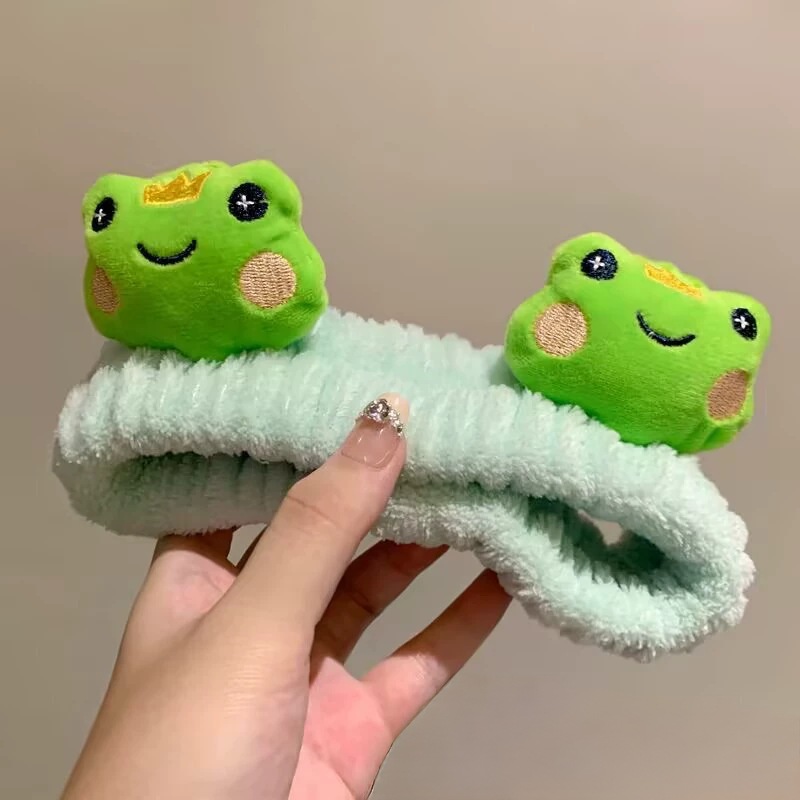 Otoño y invierno dibujos animados peluche lavar la cara cinturón de cabello máscara de mujer lavar la cara cinturón de cabello impermeable estereoscópico impermeable adornamientos de cabello al por mayor