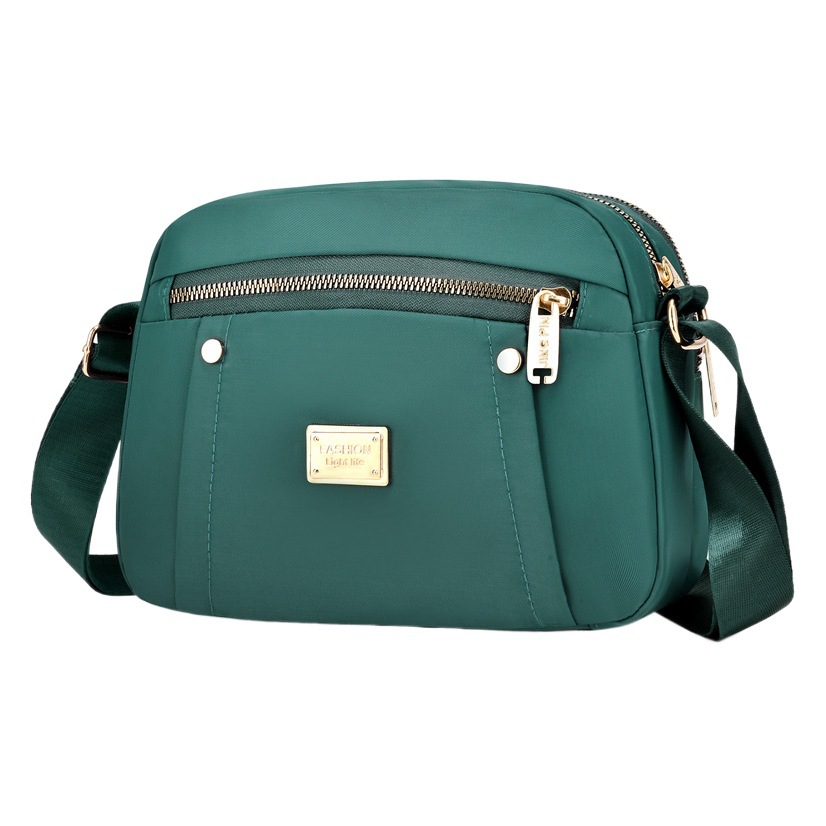 Bolsa de mensajero de tela Oxford para mujer 2023 nueva primavera de mediana edad para mujer bolsa de viaje de gran capacidad hombro nylon madre bolsa todo a juego