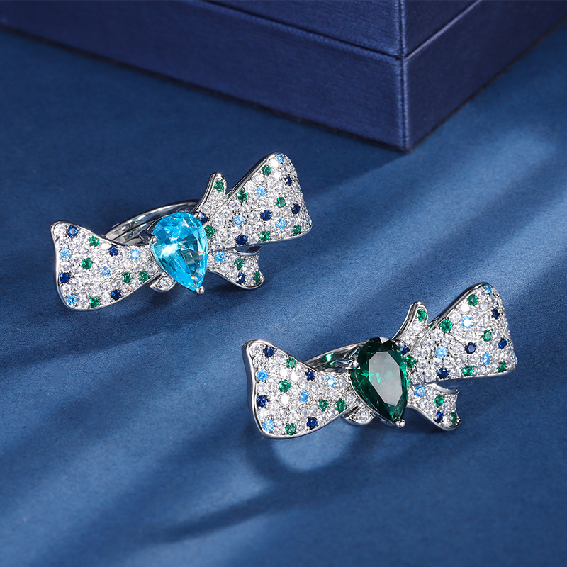 Zhuang Sheng joyas de cobre inferior chapado en oro coreano ins moda simulación color tesoro arco anillo piedra principal 8*14