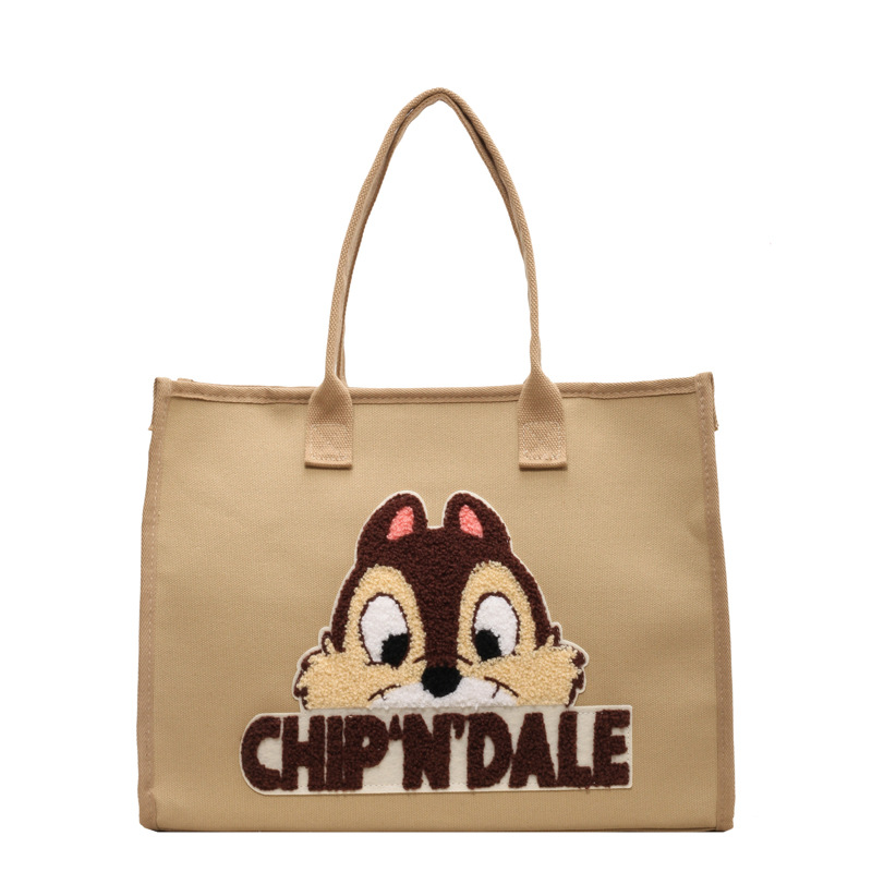 Bolsa de lona de gran capacidad para mujeres 2025 nuevo estilo urbano minimalista de moda de dibujos animados portátil de hombro para viajar bolsa