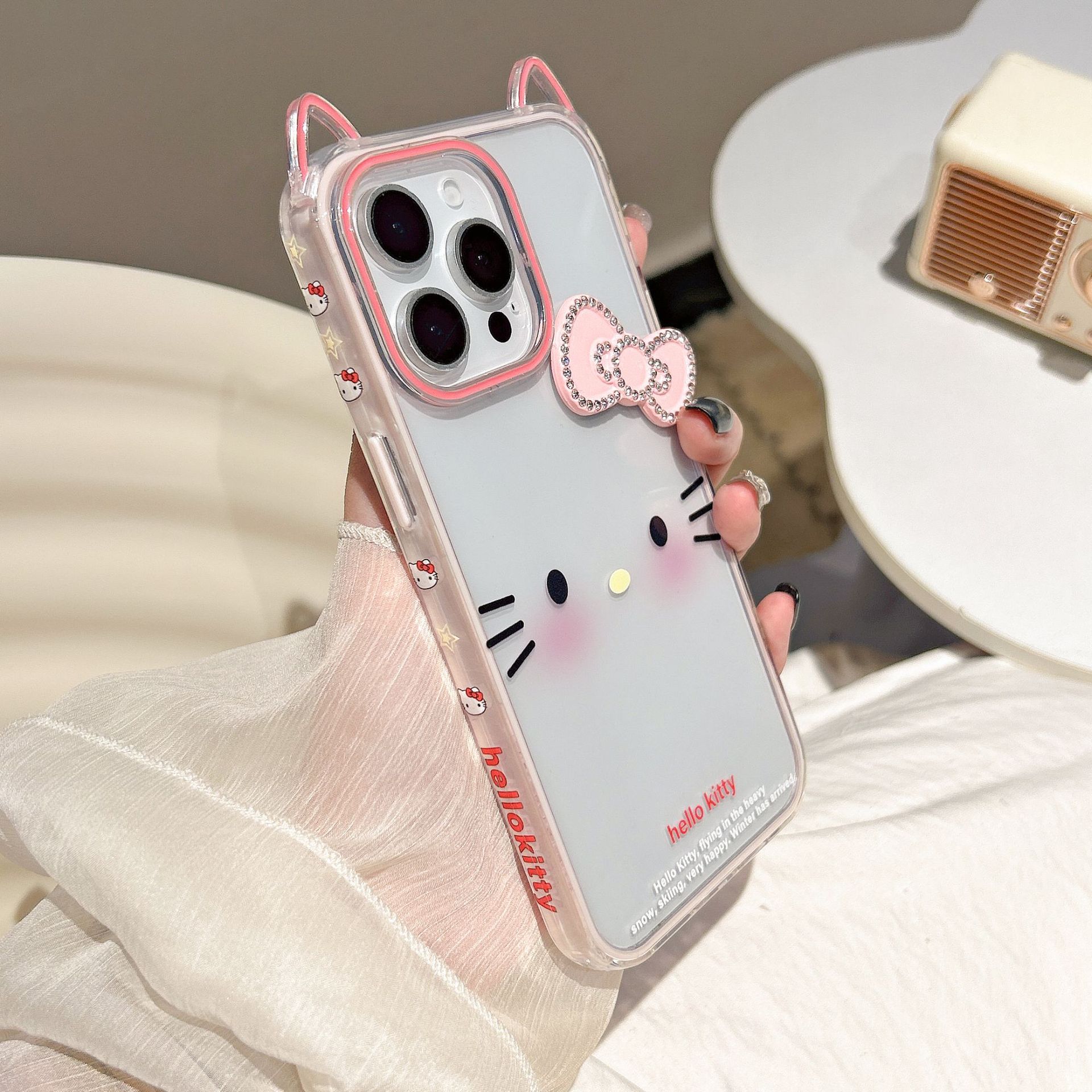 Nuevo lindo emoji KT para Apple 15/16 funda para teléfono móvil 14ProMax cuerda de mano 16PM femenino 15Pro nuevo 13