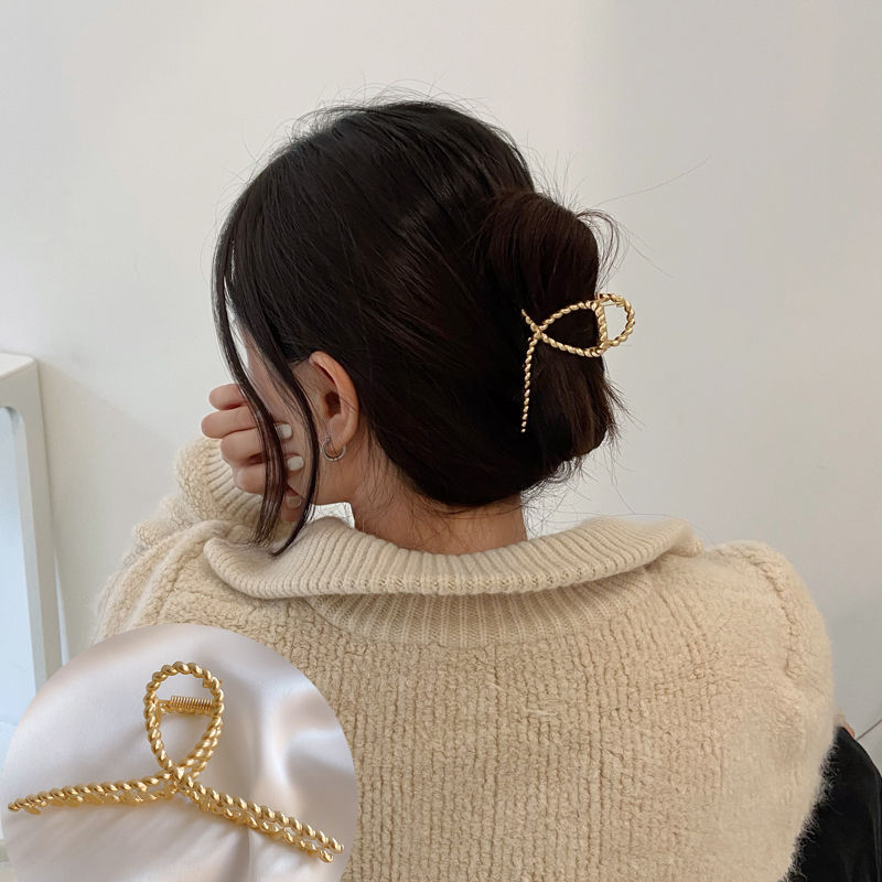 Dumb gold large twist clip.jpg