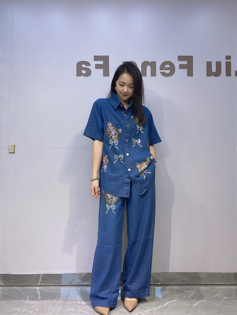 Comercio exterior transfronterizo de Europa y Estados Unidos ropa de mujer jeans de tamaño grande taladro caliente camisa de mangas cortas cintura elástica pantalones largos de piernas largas dos piezas set
