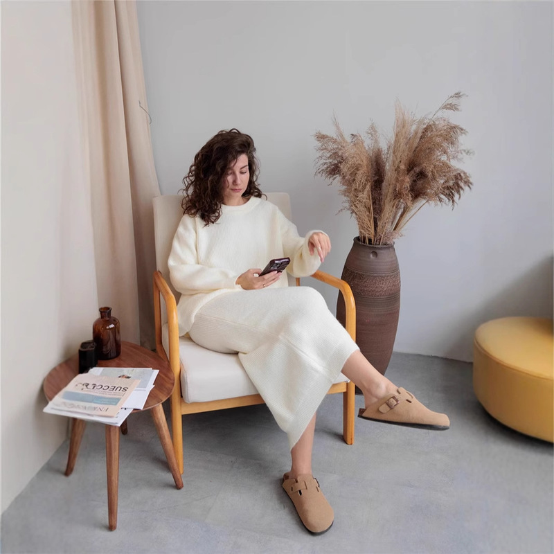 Autumn and winter new European and American style pit overskirt suit women's elegant design cardigan knitted sweater split half-length Autumn and winter new European and American style pit overskirt suit women's elegant design cardigan knitted sweater split half-length