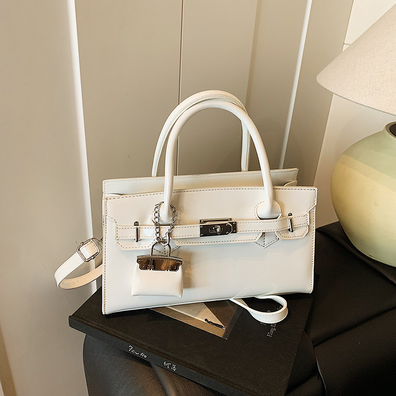 Bolso de brazo de la sensación cotidiana para mujeres 2026 nuevo nicho coreano bolso especial, moda casual, bolso de hombro universal