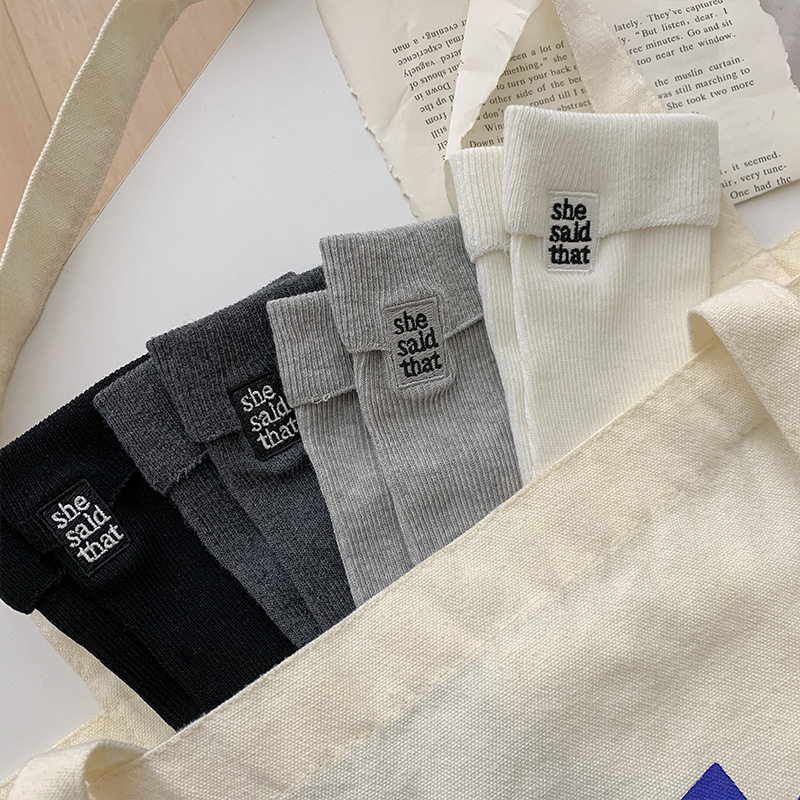 Calcetines de invierno de otoño sólido calcetines de algodón damas AB bordado tendencia vertical calcetines de pila Zhuji calcetines al por mayor