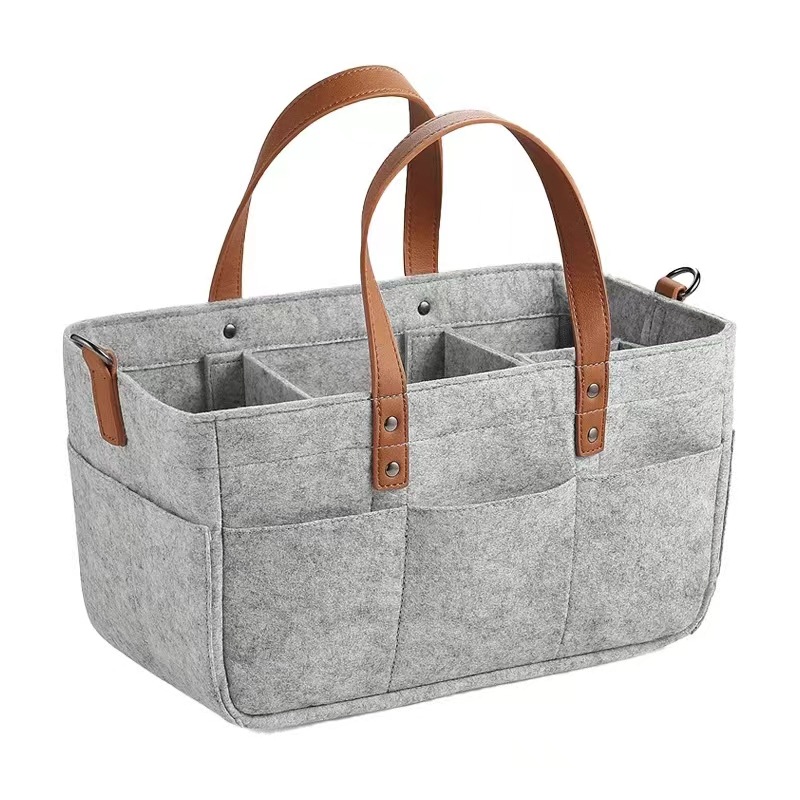 Productos para madres y bebés al por mayor transfronterizos bolsas de pañales de felt de gran capacidad de almacenamiento de pañales impermeables de mano bolsas de mano