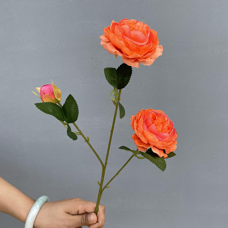 3 heads of peony-dark orange